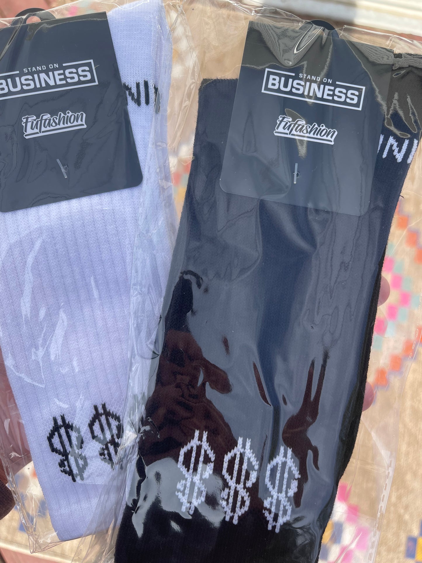 Standing on “BUSINESS” Socks