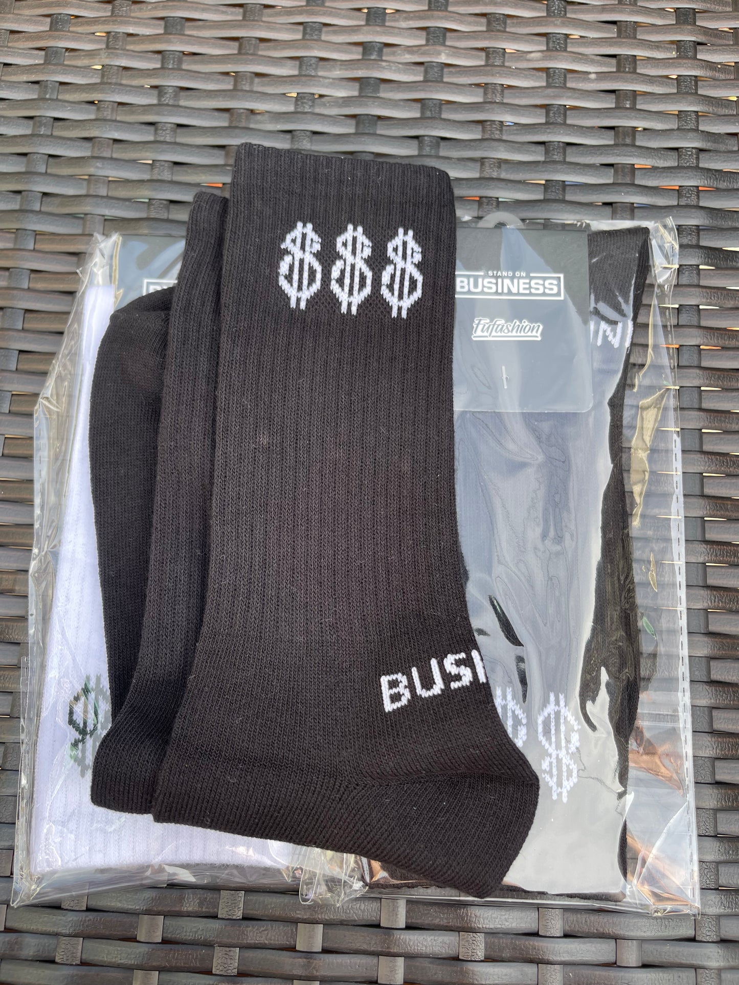 Standing on “BUSINESS” Socks